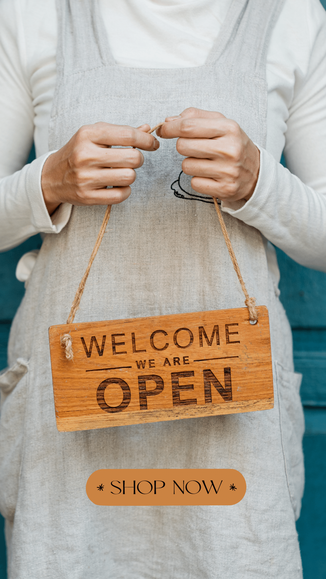 Woman in a dress holding open sign with shop now button display to etsy shop