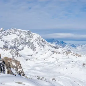 Snowy Mountains in the French Alps with luxury Chalets in Tignes