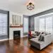 Living Room with dark Hardwood Floors and minimalist staging