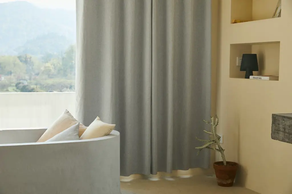 drapes vs curtians long and white curtains in a bathroom